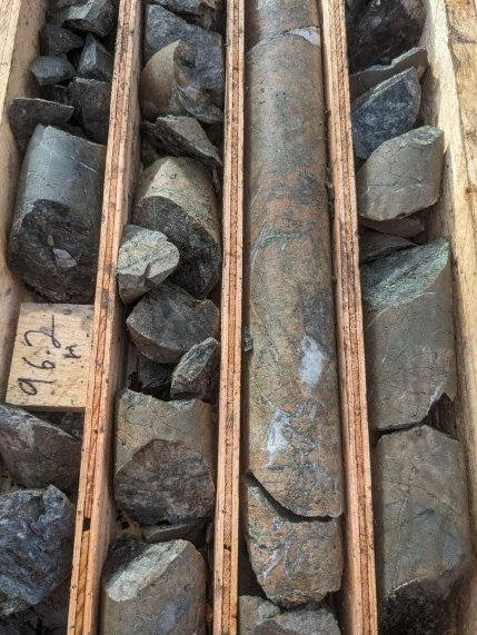 The image shows a series of stacked, weathered rock slabs with a numbered label of 962.<br /> <br /> AI-generated content may be incorrect.
